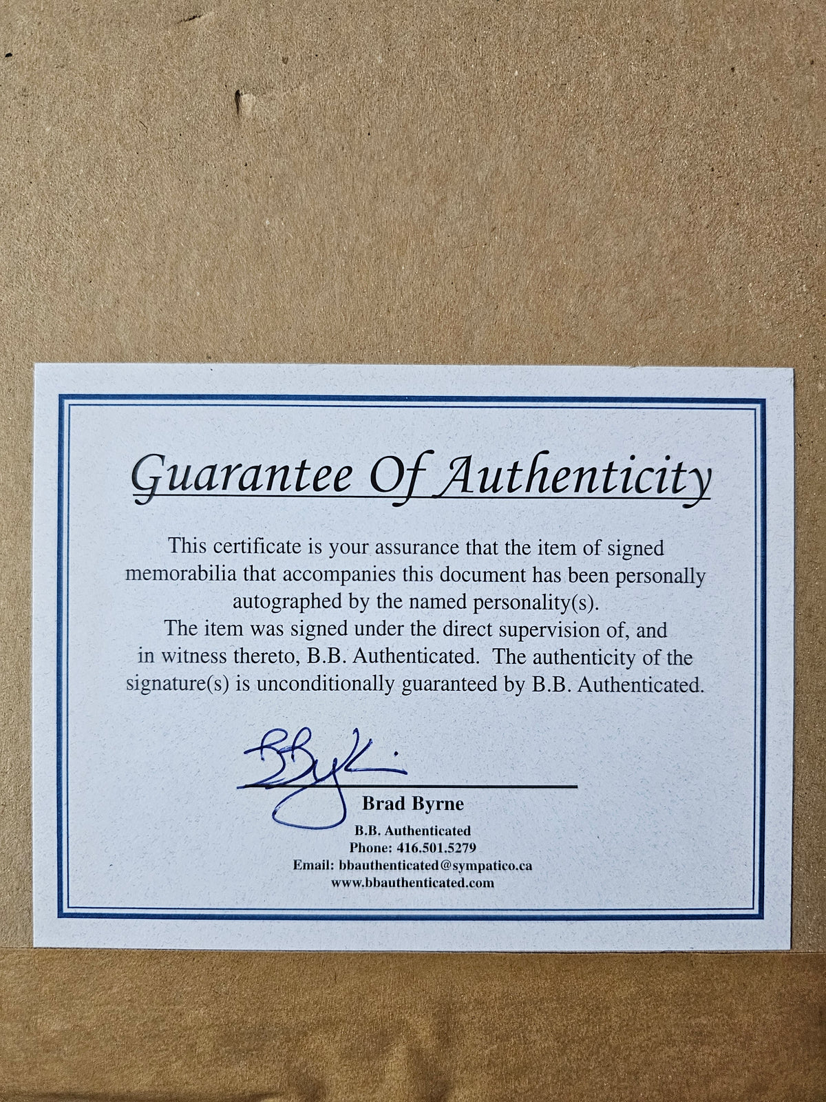 B.B. Authenticated label on frame backing