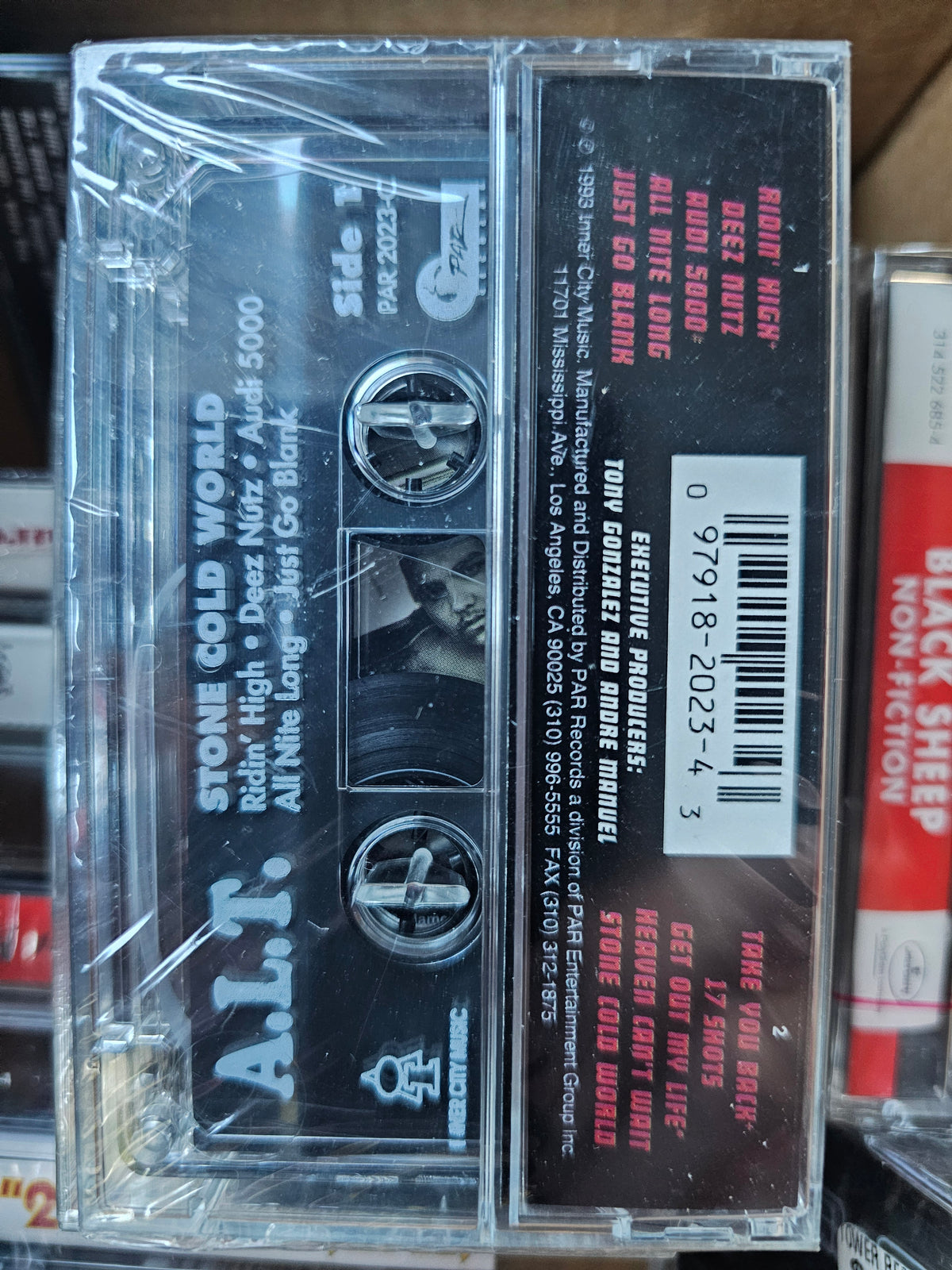 A.L.T. Stone Cold World cassette back with track listing and 1993 copyright