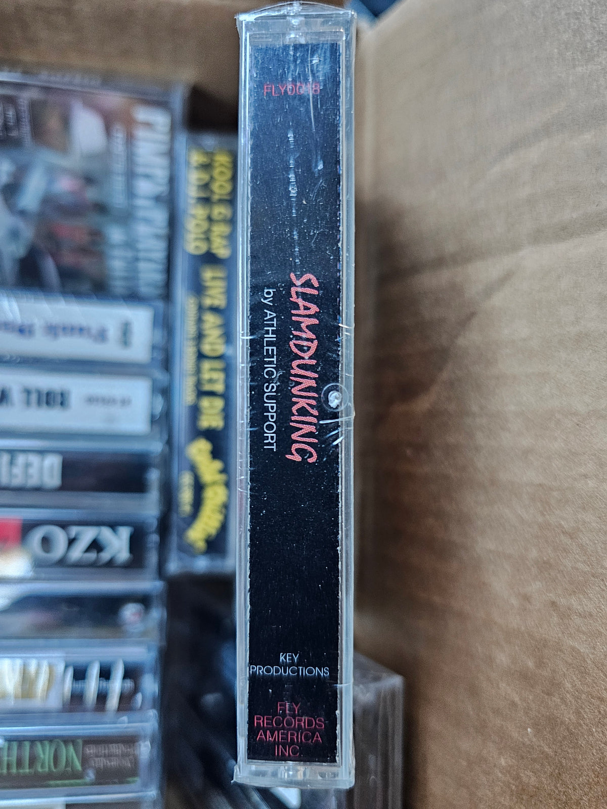 Athletic Support Slamdunking cassette spine with Fly Records America branding