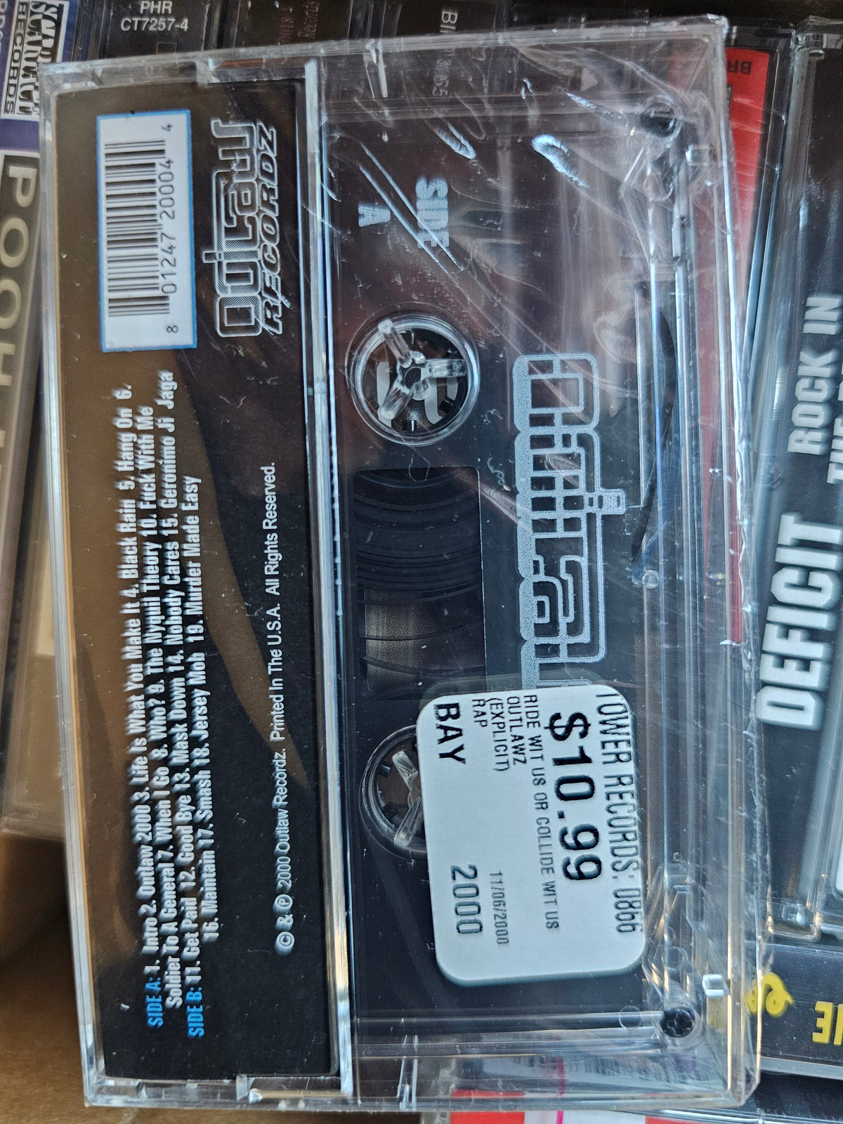 Outlawz cassette back with Tower Records price sticker and 2000 copyright