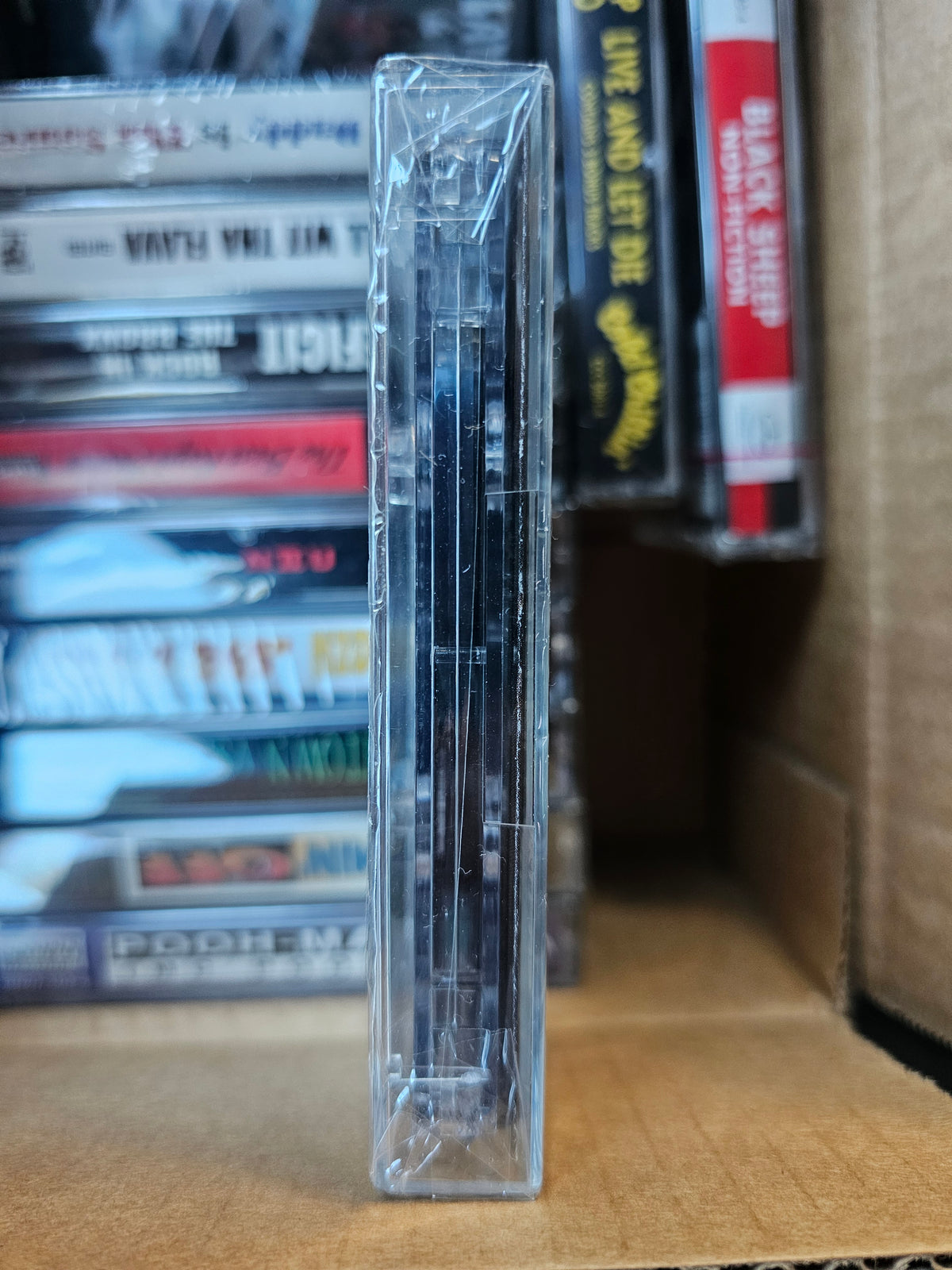 Outlawz cassette edge showing outer-wrap folds