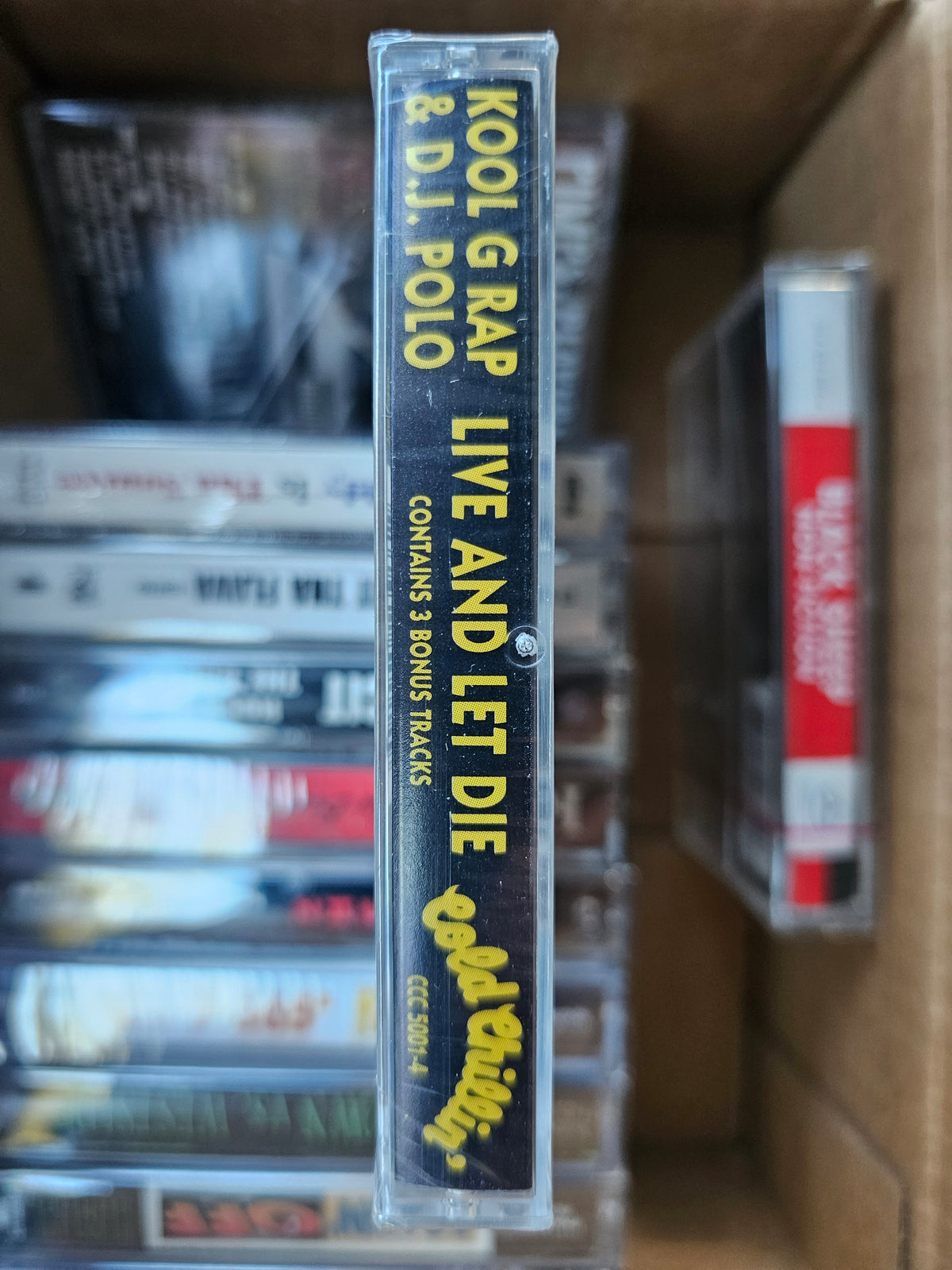 Live and Let Die cassette spine showing bonus-track wording