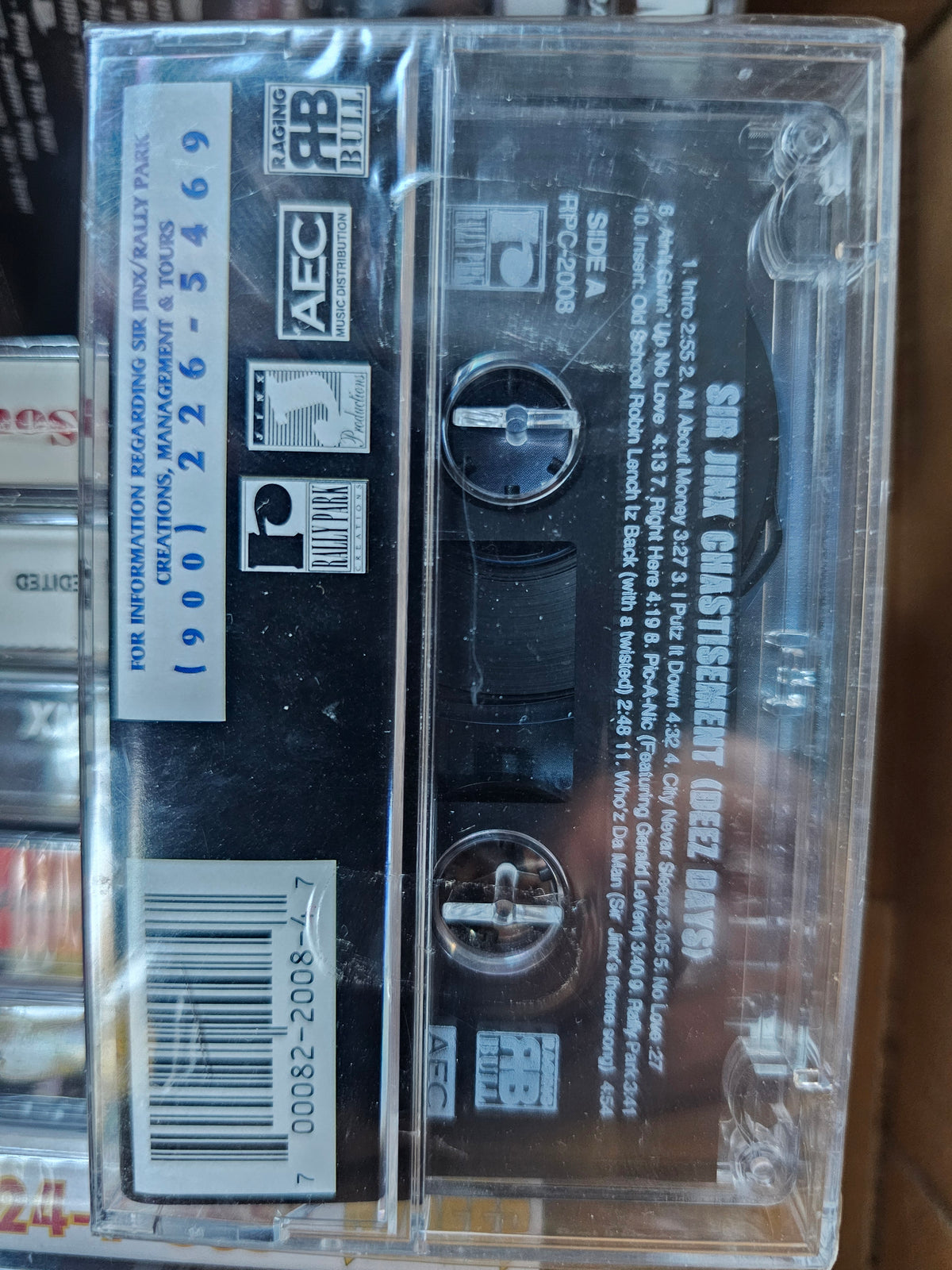 Sir Jinx cassette back with Rally Paka contact panel and distribution branding