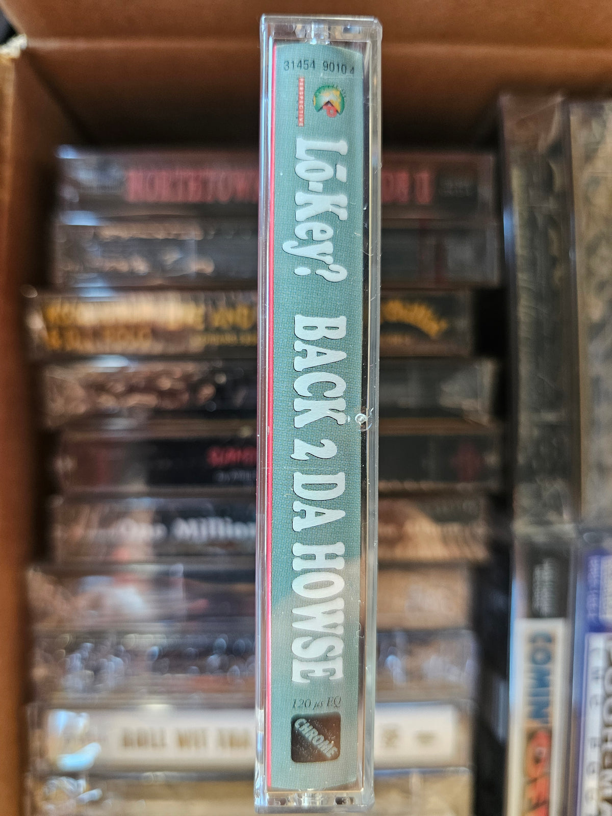 Lo-Key? Back 2 Da Howse cassette rear track listing and circular mark