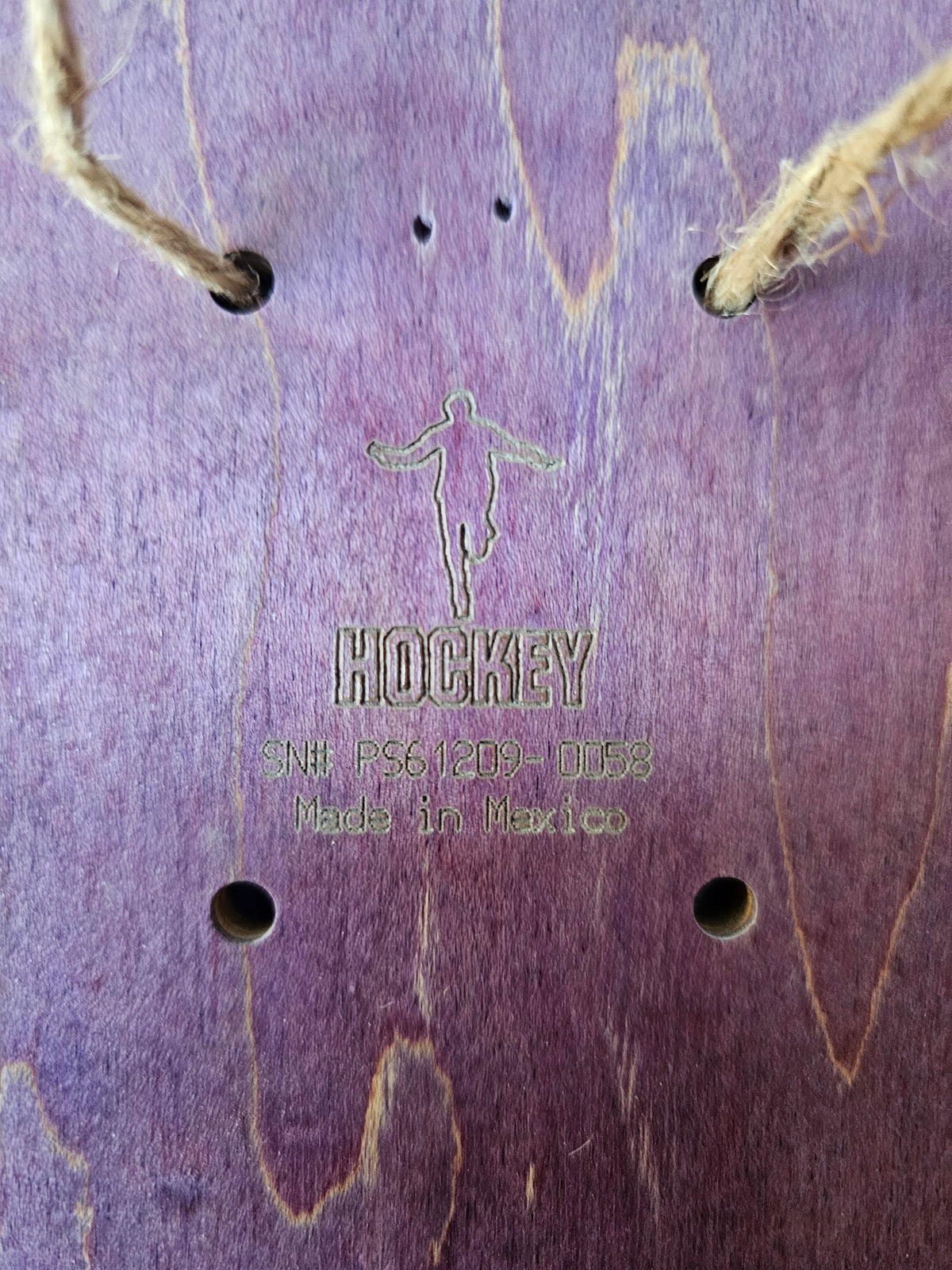 Hockey stamp and Made in Mexico marking below hanging cord