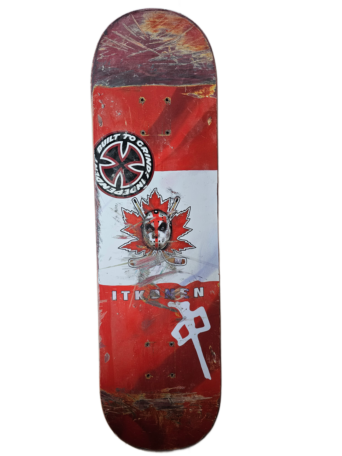 Cutout view of worn Itkonen red-and-white skateboard deck