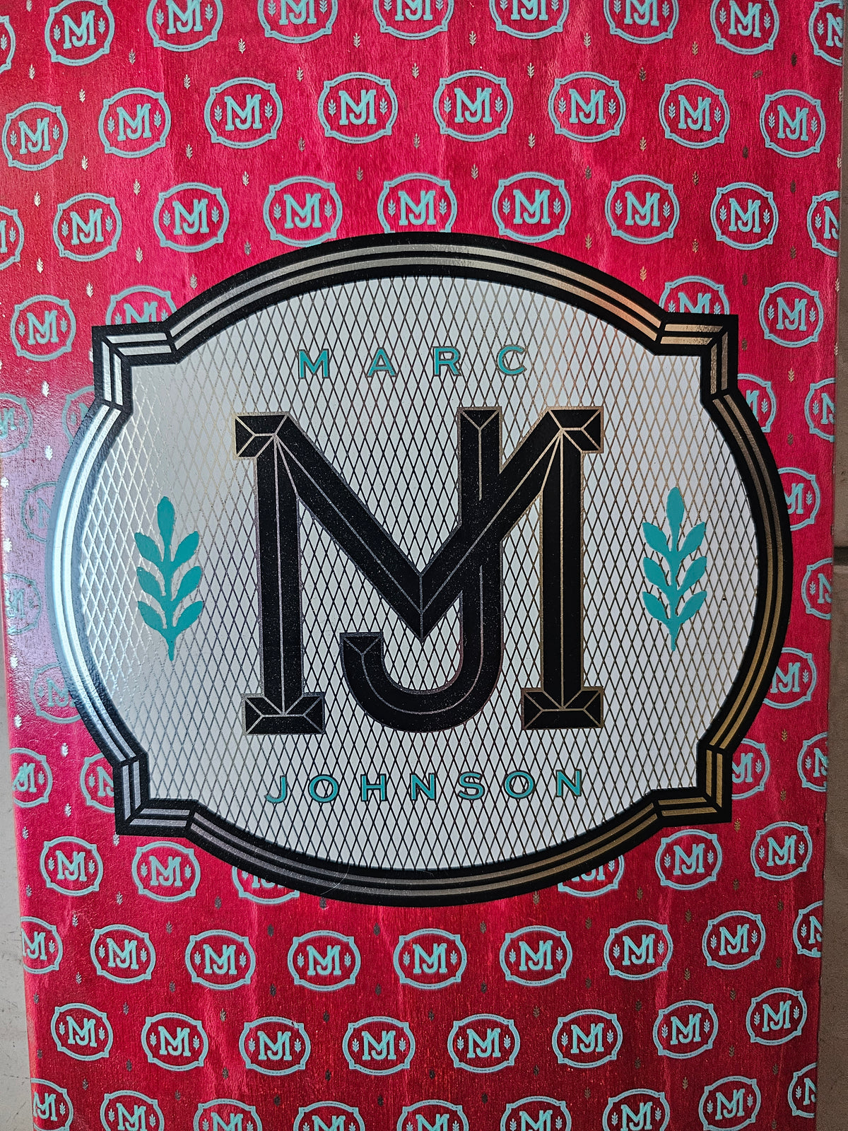 Close-up of scratched framed Chocolate logo on monogram graphic