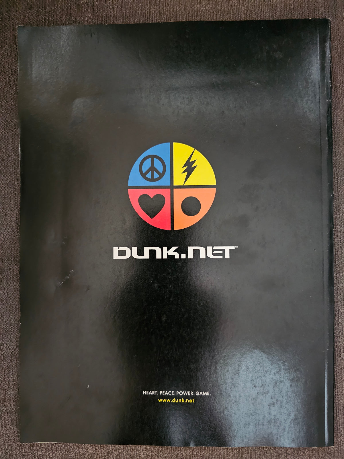 Black DUNK.NET back-cover advertisement