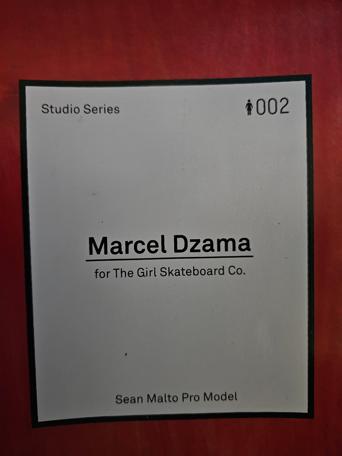 Close-up of illustrated figures in Marcel Dzama deck artwork