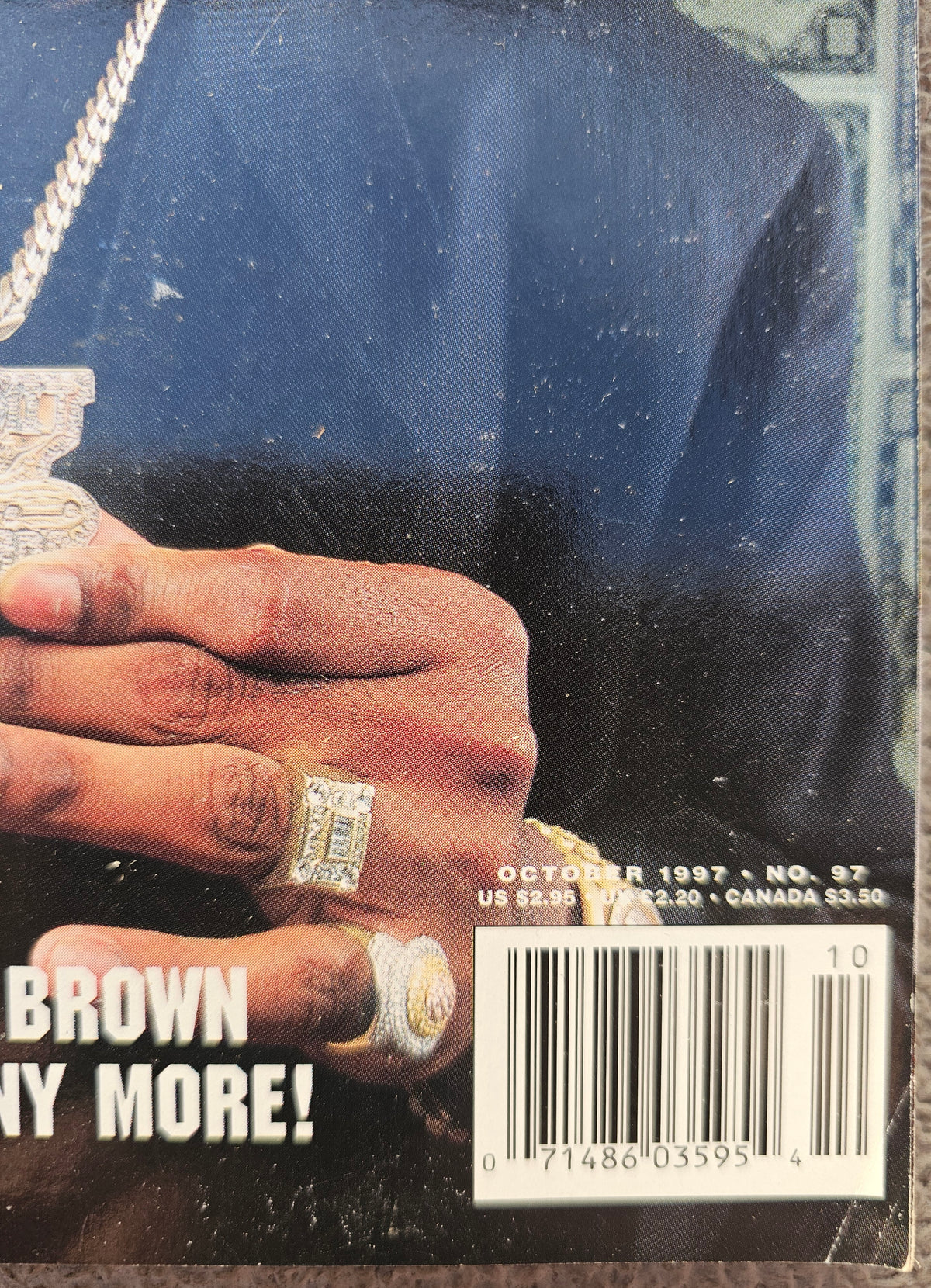 Close-up of October 1997 issue 97 date and barcode with visible cover wear