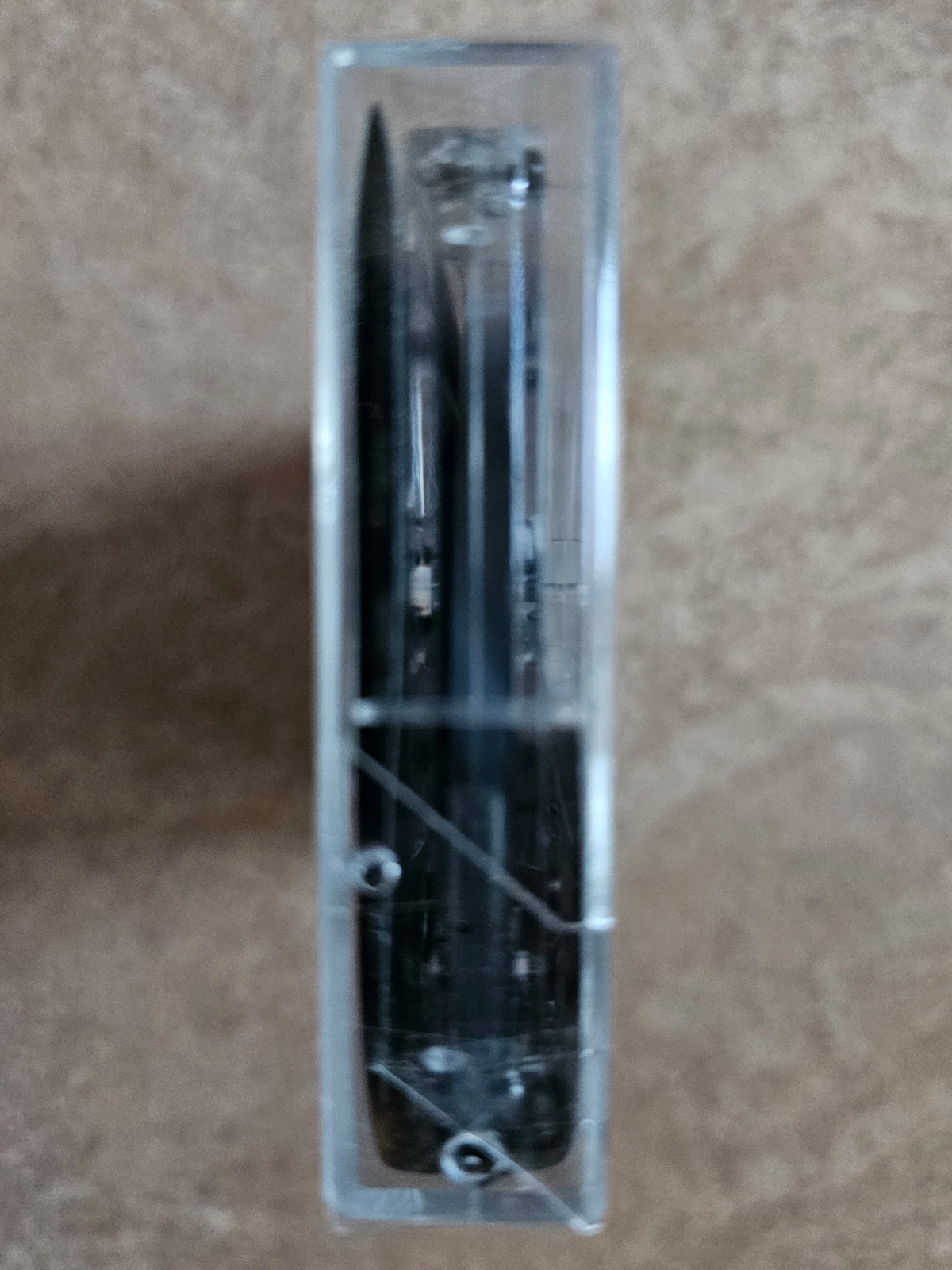 Tomi Gran cassette case end view