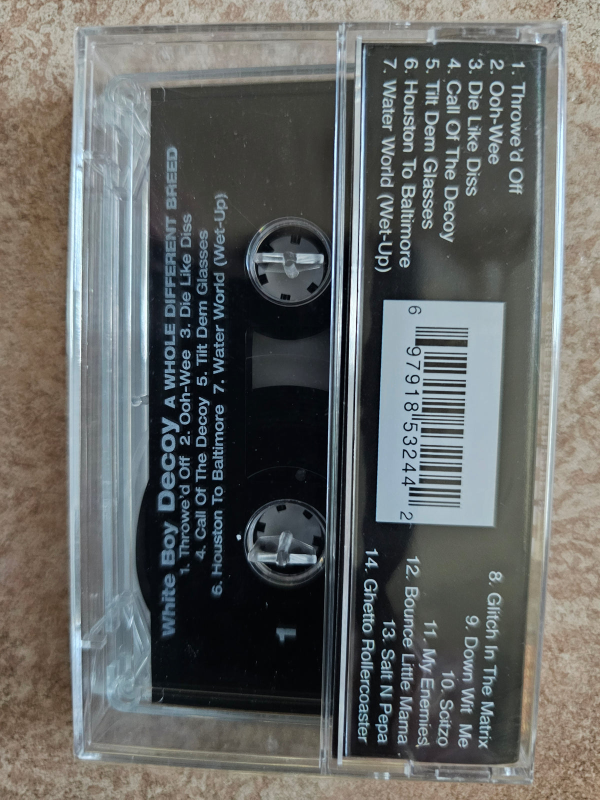 Cassette rear with track listing and barcode